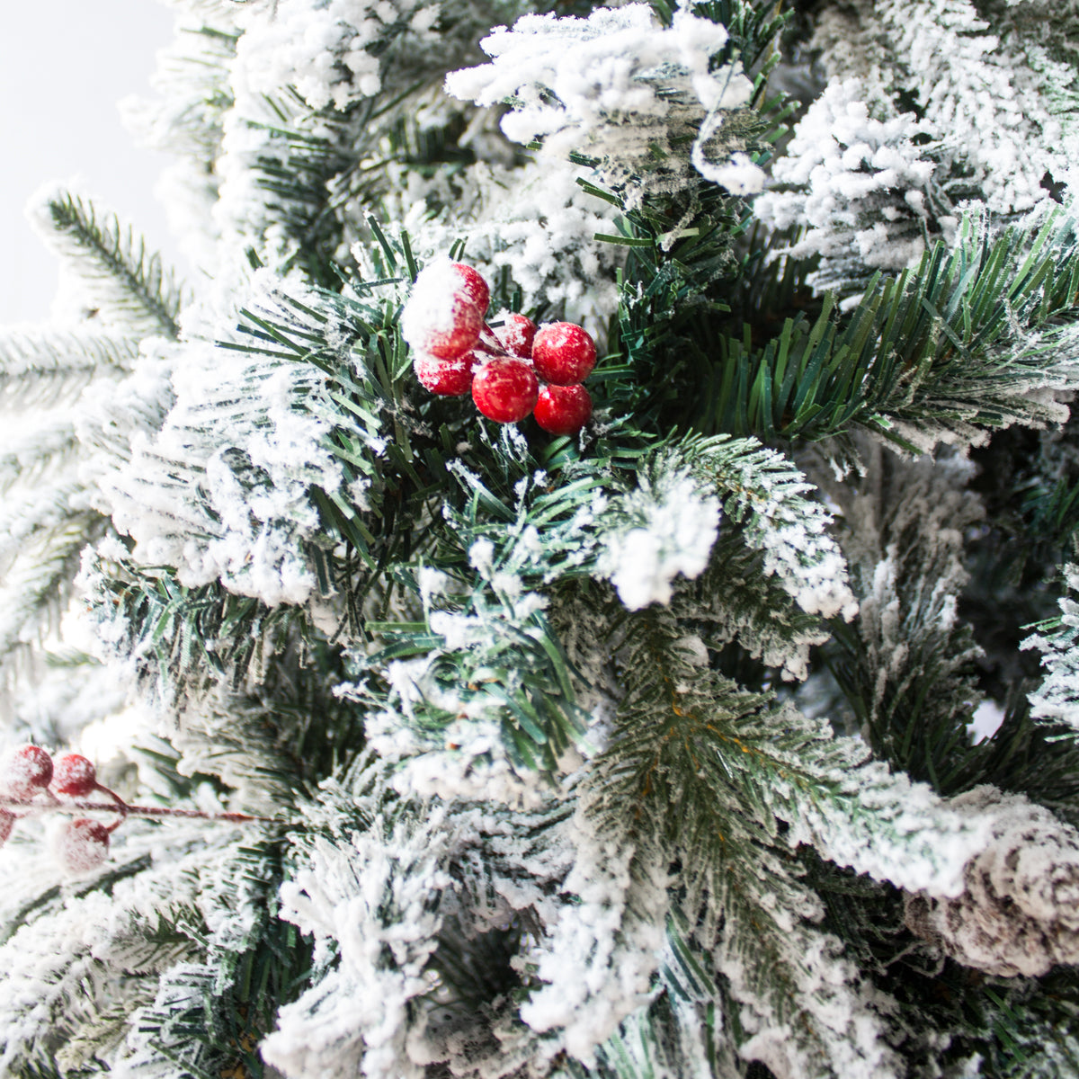 Slim Frosted Christmas Tree with Berries and Pine Cones